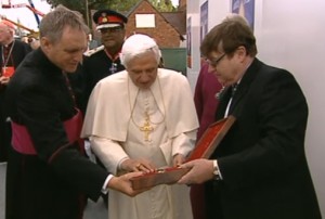 The Pope receiving the cross
